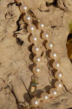 Champagne pearls with gold clasps